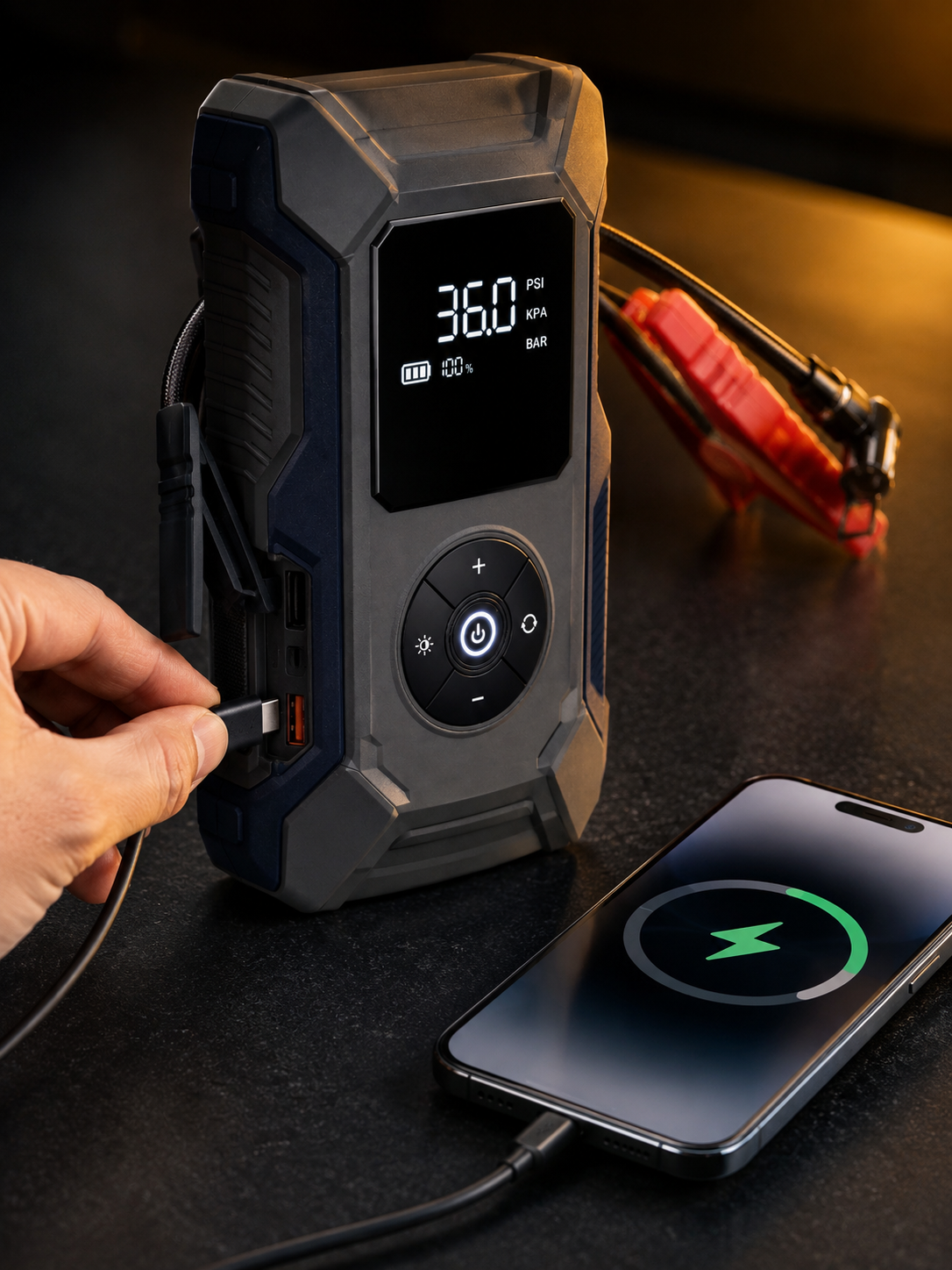 RoadGuard Pro fast-charging a smartphone via USB-C